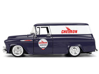 Side profile of dark blue and white 1957 Chevrolet Suburban with Chevron graphics, Jada 35044 in 1:24