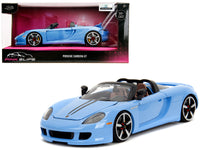 Blue Porsche Carrera GT convertible with black stripes beside Pink Slips window packaging, Jada 35066