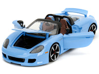 Front three-quarter view of blue Porsche Carrera GT with front compartment, doors and rear cover open, Jada 35066