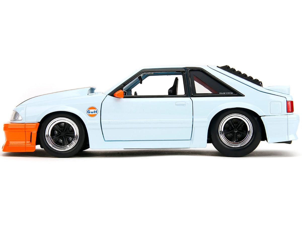 Blue and orange Gulf Oil 1989 Mustang GT, 1:24, closed side view — Jada 35208
