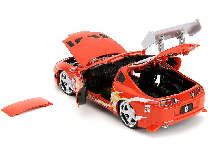1995 Toyota Supra Red with Graphics and Saitama Diecast Figure "One Punch Man" (2015-2019) TV Series 1/24 Diecast Model by Jada image 2