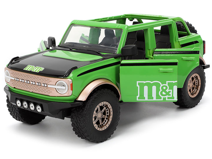 2021 Ford Bronco Green with Black Stripes and Green M&M's Diecast Figure "Hollywood Rides" Series 1/24 Diecast Model Car by Jada
