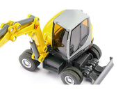 Wacker Neuson EW65 Mobile Excavator Yellow and Gray 1/50 Diecast Model by Siku image 2