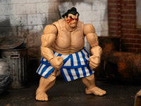 E. Honda action figure in a standing pose in styled scenery; scenery is not included, Jada 35740