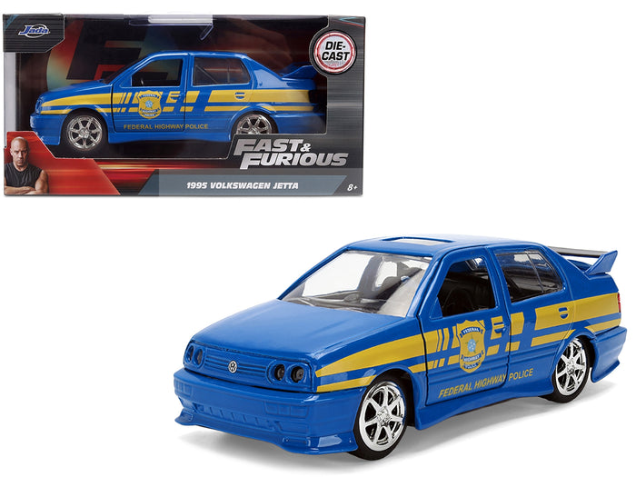Volkswagen Jetta Police Vehicle "Rio Federal Highway Police" Blue with Yellow Stripes "Fast Five" (2011) Movie "Fast & Furious" Series 1/32 Diecast Model Car by Jada