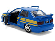 Volkswagen Jetta Police Vehicle "Rio Federal Highway Police" Blue with Yellow Stripes "Fast Five" (2011) Movie "Fast & Furious" Series 1/32 Diecast Model Car by Jada image 4