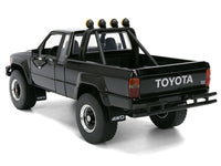 1985 Toyota SR5 Pickup Truck Black with Marty's Skateboard "Back to the Future" (1985) Movie "Hollywood Rides" Series 1/24 Diecast Model Car by Jada image 5