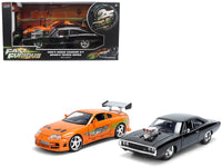 Dom's 1970 Dodge Charger R/T Black and Brian's Toyota Supra Orange with Graphics Set of 2 Cars "Fast & Furious 25th Anniversary" "Fast & Furious" Series 1/24 Diecast Model Cars by Jada