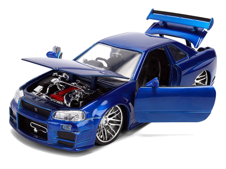 Brian's Nissan Skyline GT-R (R34) RHD (Right Hand Drive) Blue Color Brush Finish 25 Years of Fast & Furious Anniversary "2 Fast 2 Furious" (2003) Movie "Fast & Furious" 1/24 Diecast Model Car by Jada image 2