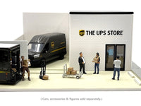 The UPS Store diorama staged with delivery vehicles, parcels and figures, all sold separately from the building; GreenLight 51491.
