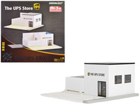 The UPS Store diorama shown beside its GreenLight MiJo Exclusives packaging; front entrance and side windows visible, 1:64 51491.