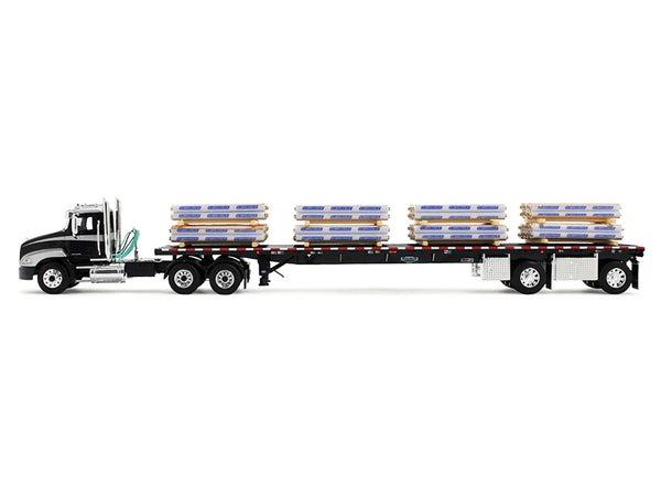 Mack Pinnacle Day Cab with Minimizer Parts & 53' Wilson Roadbrute Flatbed Trailer with "Carlisle Roofing" Loaded Pallets Black with Silver Top and Stripes 1/64 Diecast Model by DCP/First Gear