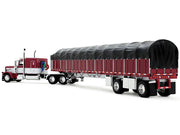 Peterbilt 389 with 63" Flat Top Sleeper and 53' Wilson Roadbrute Flatbed Trailer with Covered Wagon Maroon with White Stripes 1/64 Diecast Model by DCP/First Gear image 3