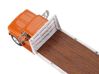 GMC 4000 Flatbed Truck Omaha Orange 1/64 Diecast Model by DCP/First Gear image 2