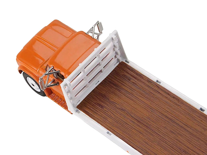 GMC 4000 Flatbed Truck Omaha Orange 1/64 Diecast Model by DCP/First Gear image 2