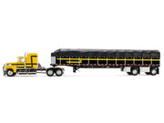 Ford LTL 9000 with 60" Aerodyne Sleeper and 53' Wilson Roadbrute Flatbed Trailer with Covered Wagon Yellow with Black Stripes 1/64 Diecast Model by DCP/First Gear image 3