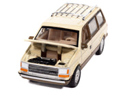 1987 Plymouth Voyager Van Light Cream and Golden Bronze Metallic 2-Tone "Mighty Minivans" Series 1/64 Diecast Model Car by Auto World image 2