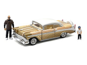 1956 Chevrolet Bel Air Lowrider Gold Metallic with Gold Interior and White Top with 2 Figures Limited Edition to 4400 pieces Worldwide 1/64 Diecast Model Car by M2 Machines image 2