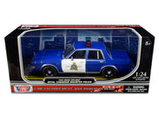 1986 Dodge Diplomat "Royal Canadian Mounted Police" Metallic Blue and White 1/24 Diecast Model Car by Motormax
