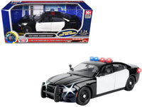 Motormax Dodge Charger Pursuit black and white example for the Muncle Mikes Motormax 1:24 Club; exact monthly selection varies.