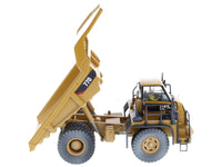 Diecast Masters CAT 770 off-highway truck weathered yellow operator 1:50 85756, product image 1