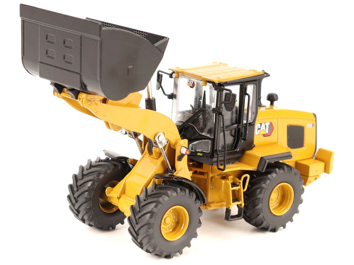 CAT Caterpillar 938 Wheel Loader with Operator Yellow "High Line" Series 1/50 Diecast Model by Diecast Masters image 2