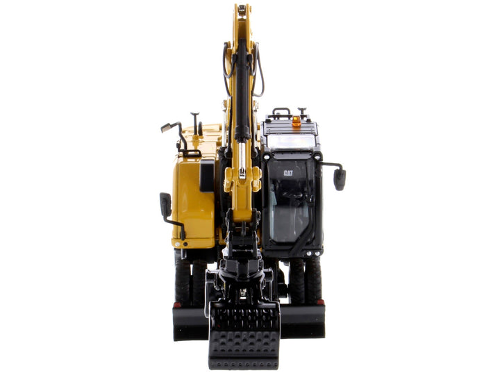 CAT Caterpillar M318 Wheeled Excavator Yellow with Operator "High Line" Series 1/50 Diecast Model by Diecast Masters image 2
