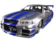 Brian's Nissan GTR Skyline R34 RHD (Right Hand Drive) Silver with Blue Stripes "Fast & Furious 25th Anniversary" 1/24 Diecast Model Car by Jada image 2