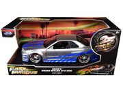 Brian's Nissan GTR Skyline R34 RHD (Right Hand Drive) Silver with Blue Stripes "Fast & Furious 25th Anniversary" 1/24 Diecast Model Car by Jada image 3