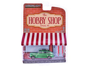 1946 Ford Fordor Super Deluxe Green Metallic with White Interior and Roof Rack with Surfboards "The Hobby Shop" Series 16 1/64 Diecast Model Car by Greenlight image 2