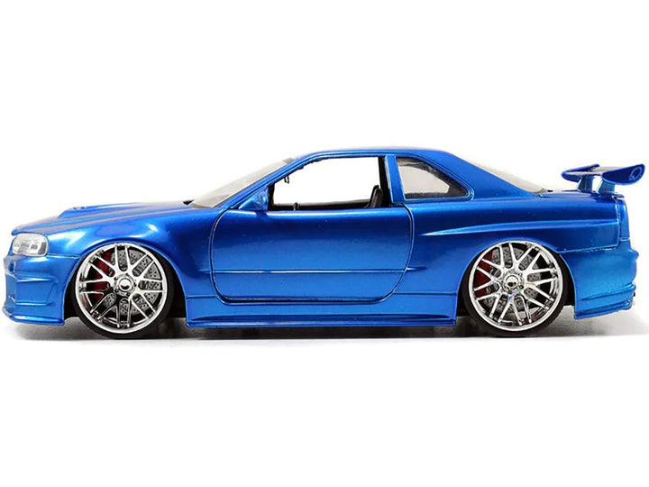 Brian's Nissan GTR Skyline R34 RHD (Right Hand Drive) Blue 25th Anniversary "Fast & Furious" Movie 1/24 Diecast Model Car by Jada image 2