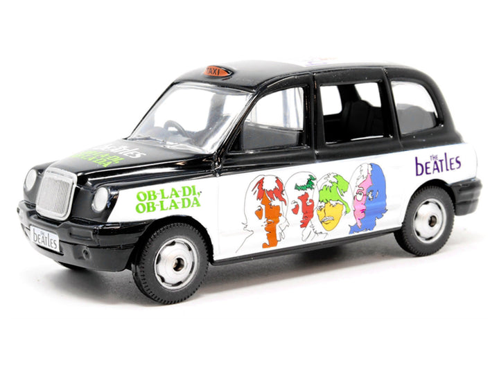The Beatles London Taxi RHD (Right Hand Drive) "Ob-La-Di Ob-La-Da" Black and White with Graphics Diecast Model by Corgi image 2