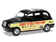 The Beatles London Taxi RHD (Right Hand Drive) "I Want To Hold Your Hand" Black and Cream with Graphics Diecast Model by Corgi image 2