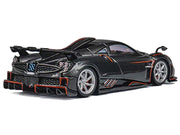 Pagani Imola Dark Gray Metallic with Carbon and Orange Accents with Extra Wheels 1/64 Diecast Model Car by CM Model image 2