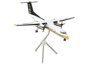 Bombardier C-147A Transport Aircraft "Golden Knights Parachute Team" United States Army (17-01610) White with Yellow Stripes and Black Tail "Gemini 200" Series 1/200 Diecast Model Airplane by GeminiJets image 2