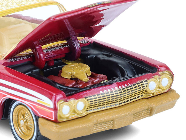 1963 Chevrolet Impala Lowrider "Michael Heralda Special Edition" Red Metallic with Cream Top and Interior with Gold Graphics "Hobby Exclusive" Series 1/64 Diecast Model Car by Greenlight image 2