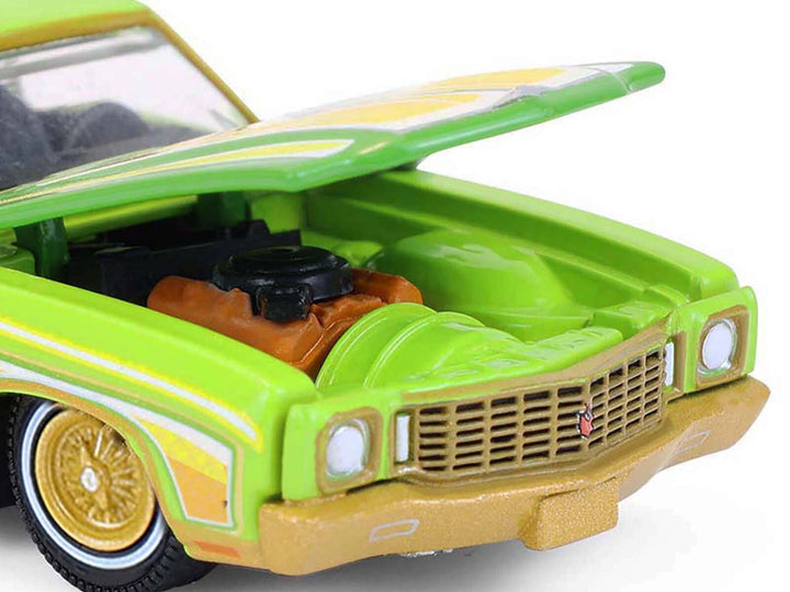 1970 Chevrolet Monte Carlo Lowrider "Michael Heralda Special Edition" Lime Green with Graphics "Hobby Exclusive" Series 1/64 Diecast Model Car by Greenlight image 2