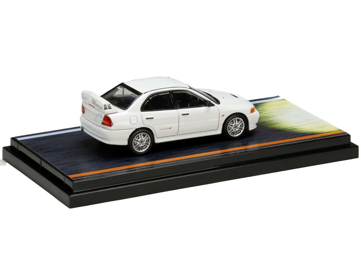 Mitsubishi Lancer RS Evolution IV RHD (Right Hand Drive) White "Monstar" with Seiji Iwaki Driver Figure "Initial D" (1995-2013) Manga 1/64 Diecast Model Car by Hobby Japan image 2