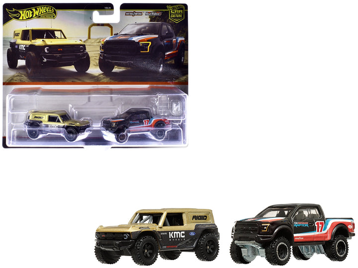 Ford Bronco R Gold Metallic and Black and 2017 Ford F-150 Raptor Pickup Truck #17 Black with Stripes "Car Culture" Set of 2 Cars Diecast Model Cars by Hot Wheels image 2