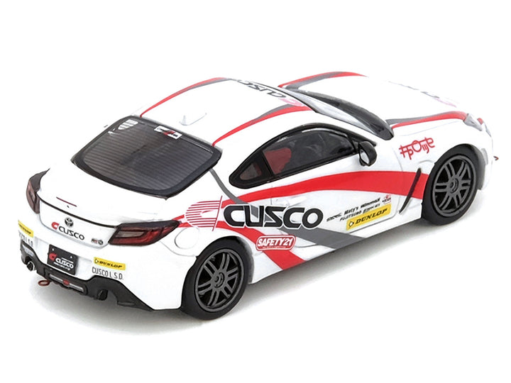 Toyota GR86 Tuned by "CUSCO" RHD (Right Hand Drive) White with Red and Gray Stripes 1/64 Diecast Model Car by Inno Models image 2