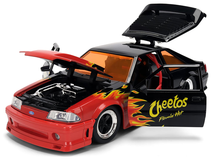 1989 Ford Mustang GT Black with Red Flame Graphics and Chester Cheetah Diecast Figure "Cheetos Flamin' Hot" "Hollywood Rides" Series 1/24 Diecast Model Car by Jada image 2
