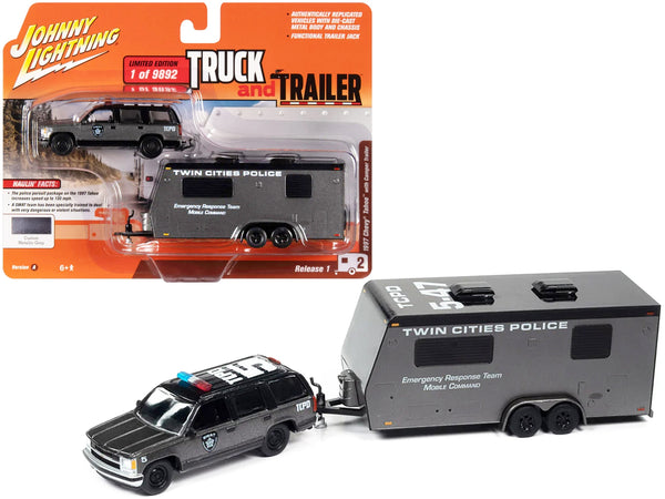 Johnny Lightning 1997 Chevrolet Tahoe SWAT and Twin Cities Police camper-trailer set.