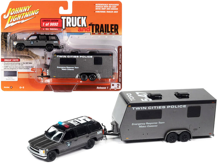 Johnny Lightning 1997 Chevrolet Tahoe SWAT and Twin Cities Police camper-trailer set.