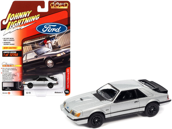 Johnny Lightning 1986 Ford Mustang SVO in silver with black stripes.