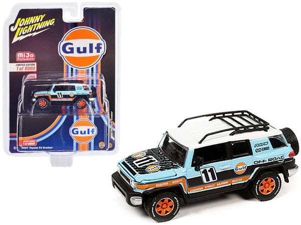 Johnny Lightning 2007 Toyota FJ Cruiser #11 in light-blue Gulf livery with roof rack.