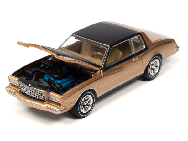 Johnny Lightning 1980 Monte Carlo in Light Camel Gold with black roof and hood, OK Used Cars series.
