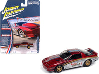 Johnny Lightning 1987 Firebird GTA King of the Jungle in red and silver.