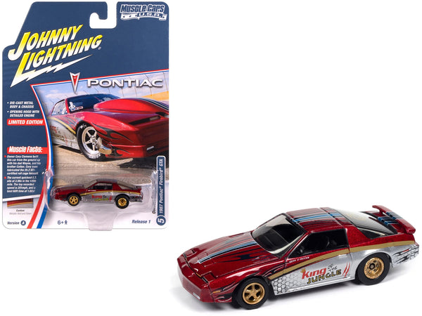 Johnny Lightning 1987 Firebird GTA King of the Jungle in red and silver.
