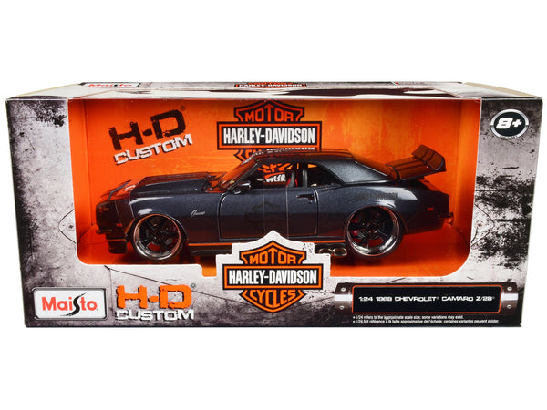 Maisto 1:24 1968 Chevrolet Camaro Z/28 in dark gray metallic with Harley-Davidson graphics.