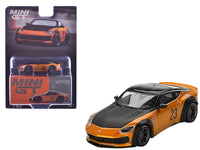 MINI GT 1:64 Nissan Fairlady Z #23 LB-Nation Works in LB Gold with black hood and roof.